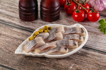 Slided marinated salted herring fillet