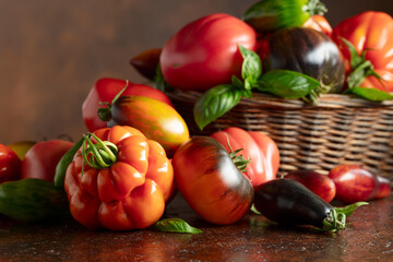 Tomatoes on a brown background.