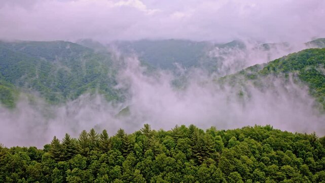 Drone footage of the mist-laden Smoky Mountain landscape