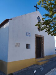 Exterior view of a small church in the Portuguese coastal town of Vilanova de Milefontes