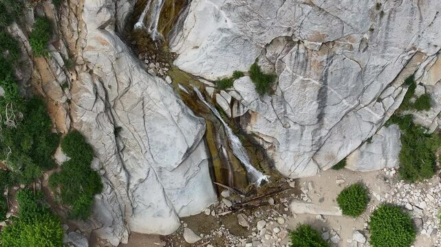 Aerial granite mountain canyon waterfall forest Utah climb 1. Wasatch Mountain Range central Utah, outside Salt Lake City, Utah. Winter summer recreation. Landscape scenic and rugged. Cliff.