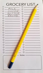 Grocery list and pencil