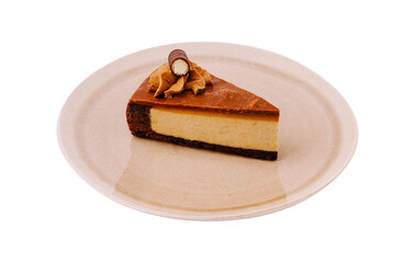 Delicious slice of caramel cheesecake on a simple plate