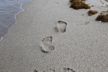 deep footprints in the sand