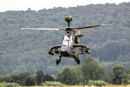 German Army armed attack helicopter hovering in mid-air during flight operation