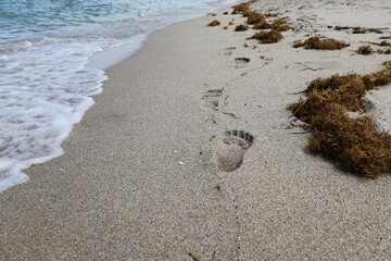 deep footprints in the sand