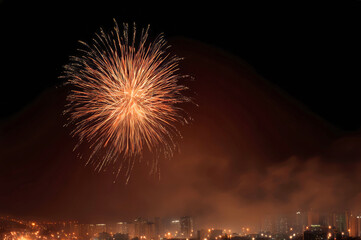 Enchanting night sky filled with fireworks over a vibrant cityscape during New Year's Eve celebration