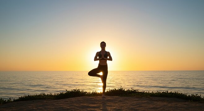 Yoga silhouette sunset ocean