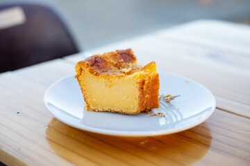 Close-up of a slice of homemade cake on a plate.
