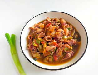 tumis cumi or oseng cumi or stir fried squid, traditional cuisine from Indonesia