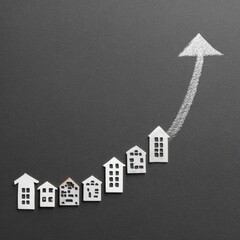 Houses on a chart, upward trend