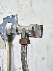 Water shut-off valve and shut-off valve in a bathroom sink renovation