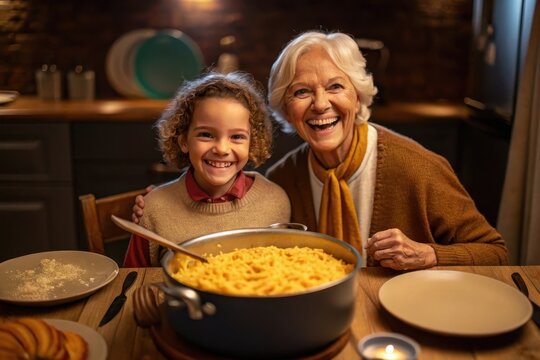 A child and grandparent laughing while serving macaroni and cheese from a big pot - Powered by Adobe