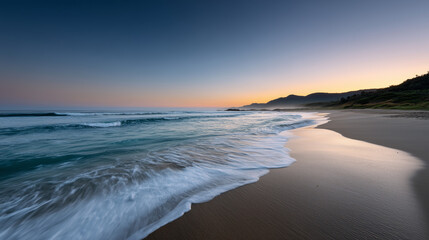 Peaceful Sunset Over Empty Beach with Soft Water Motion