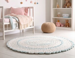 Cozy nursery interior featuring a round braided rug in soft pastel colors, a crib with a pink blanket, and a knitted pouf, creating a warm and inviting atmosphere