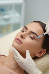 Cosmetic procedure injection of filler into womans face