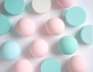 Colorful geometric shapes including pastel spheres and circular blocks arranged artistically on a white surface, creating a visually appealing composition with soft hues and modern design elements
