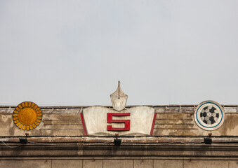 School logos on a building, DGC, Pyongyang, North Korea