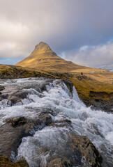 Kirkjufell mountain and the kirkjufellfoss waterfall at grundarfjordur at Snaefellsnes peninsula Iceland