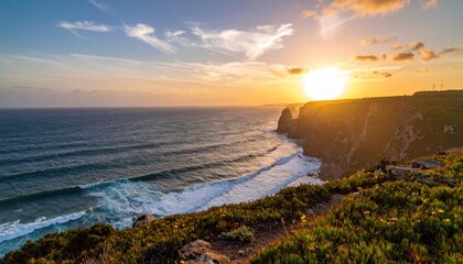 Dramatic sunset over ocean cliffs