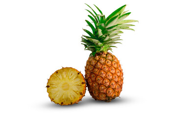 Pineapple with half and slices isolated on a white background