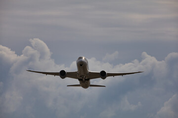 Airplane in the Sky -  Vacation -  Travel - Holidays - Tourism 
