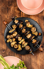 Skewers of vibrant vegetables and mushrooms.