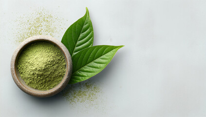 Wooden Bowl with Matcha Powder and Tea Leaves