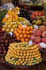Vertical basket with yellow and green fruits on Madeira market