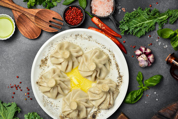 Traditional georgian dumplings, khinkali with meat. Khinkali on a plate.