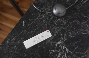 Remote control for floor lamp.Smart home concept.
