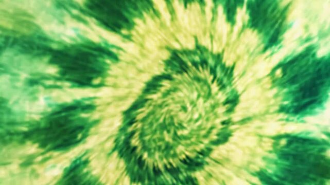 Green and yellow tie dye swirl creating psychedelic pattern