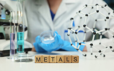 An artistic portrayal of metals, scientific principles, and research in a chemistryfocused...