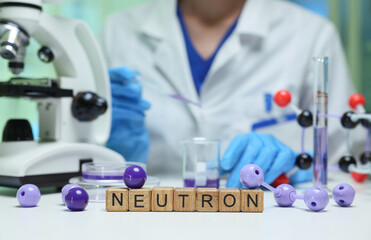 A laboratory scene highlighting the role of neutrons and microscopy in scientific exploration and...