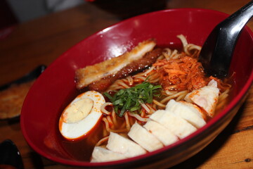 Flavor fusion! Hot Japanese ramen crowned with golden Indonesian yam katsu. Must-try comfort food