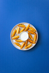Baked potato with white sauce. Healthy food. Vegetarian food.
