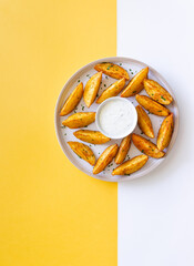 Baked potato with white sauce. Healthy food. Vegetarian food.