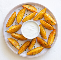 Baked potato with white sauce. Healthy food. Vegetarian food.