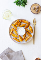 Baked potato with white sauce. Healthy food. Vegetarian food.