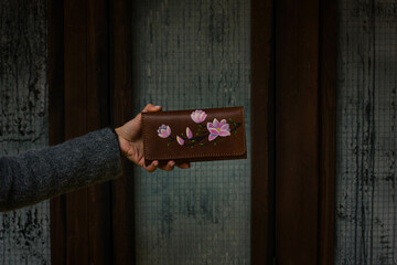 display of handcrafted leather bag