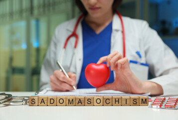 A healthcare professional with an artistic heart symbol, representing love and complex...