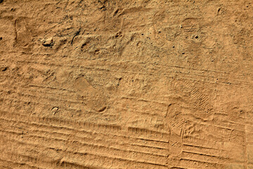Textured ground with shoe impressions