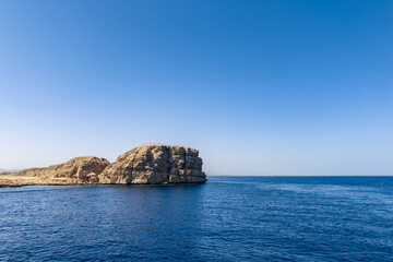 A rocky outcrop in the Gulf of Aqaba off the desert shores of Ras Mohamed National Park in South Sinai.