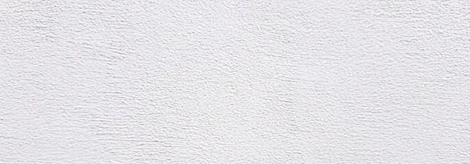 White rough stucco wall texture. Background shows textured surface for design, architecture, or web.