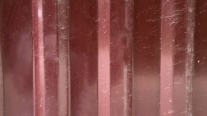 Red metal profile texture with scratches — ideal technical background for industrial and...