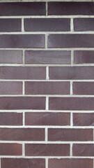 Rough texture of dark gray metal profile with vertical ridges — a technical and architectural element for industrial themes