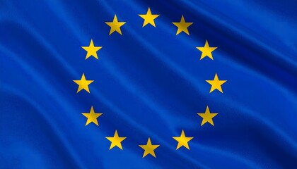 Close up of the waving flag of the European Union (EU). A circle of twelve golden stars on a blue background. Symbol of European unity, politics, and international relations