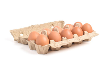 Cardboard egg box with eggs isolated on white backgound with clipping path