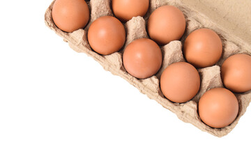 Eggs in paper tray isolated on white background. Top view