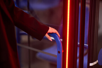 The Night Bus Ride An Experience of Waiting to Depart Under Vibrant Neon Lights at Dusk